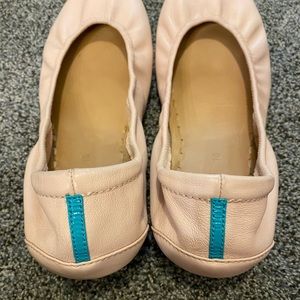 Gently used pair of ballerina pink tieks in size 10
